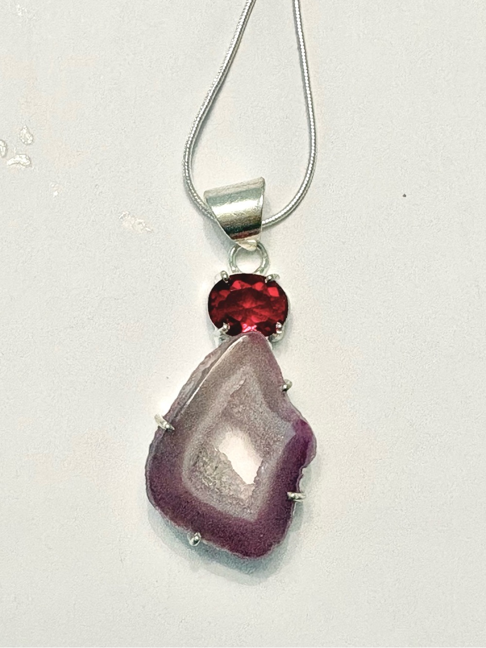 Beautiful, 1 1/2 inch, natural Solar Agate, and Garnet pendant on a silver chain